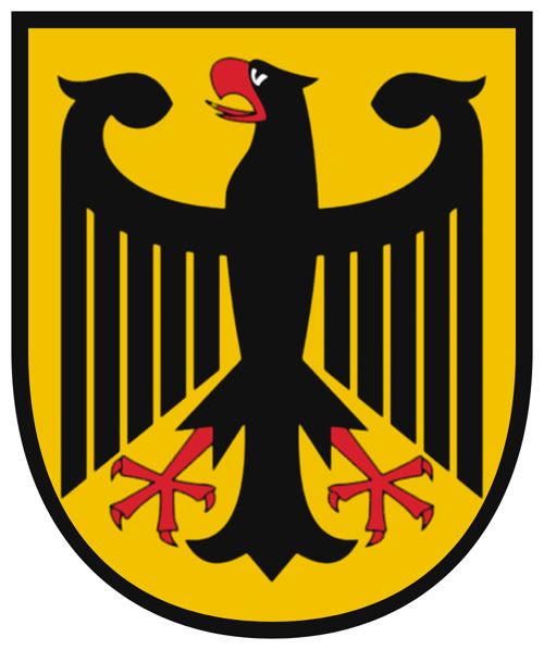 Escudo amarillo de la Quinta: águila negra con pico, lengua y garras rojas sobre fondo amarillo, con borde negro